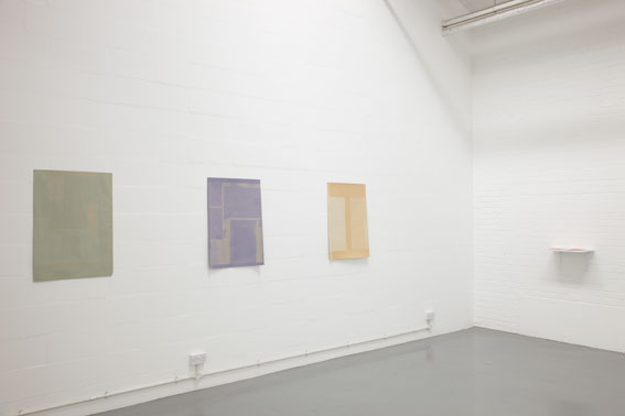 A picture of exhibition faded paper by Sara MacKillop at Spike Island Bristol